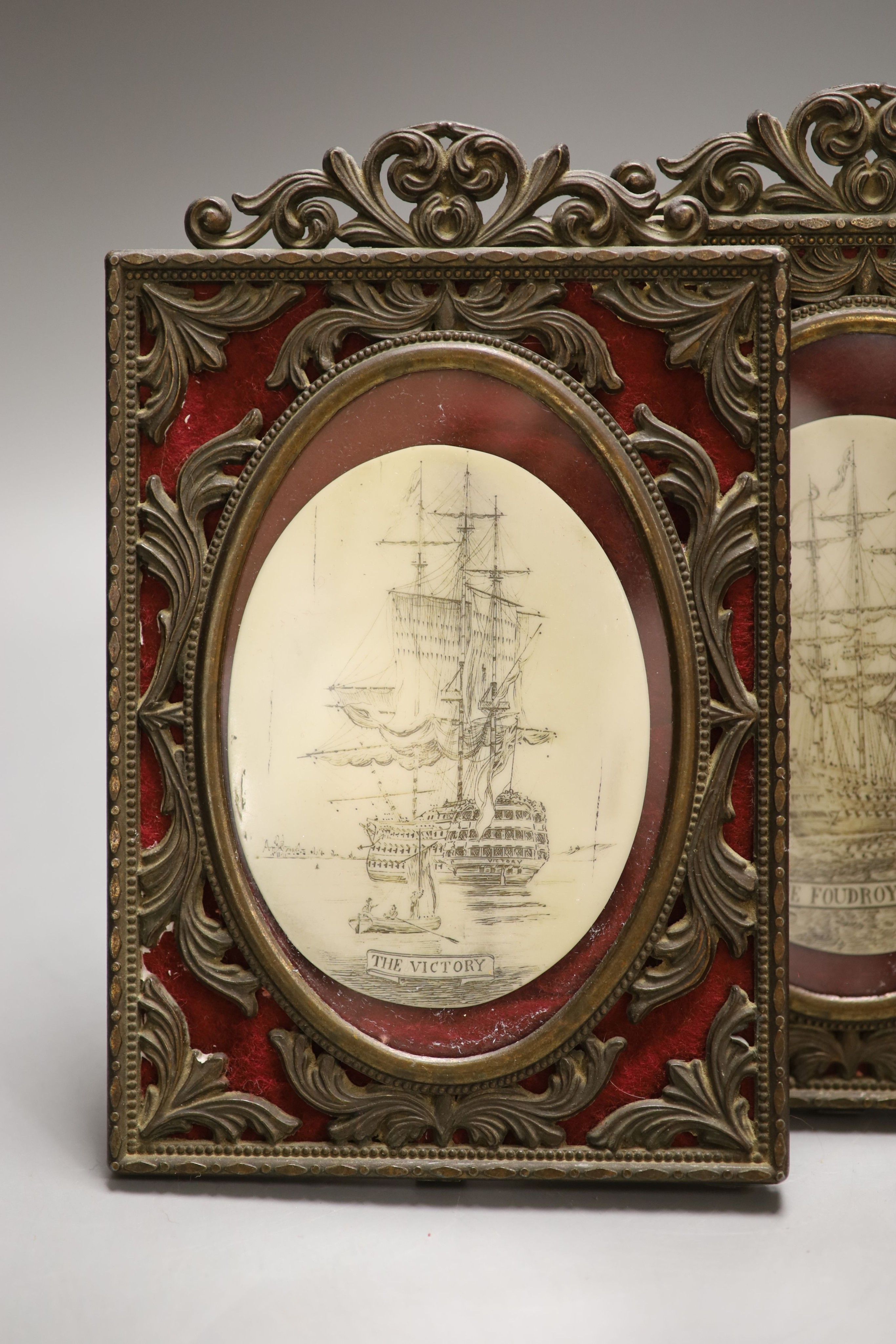 A pair of simulated scrimshaw panels, Victory and Foudroyant, in frames
